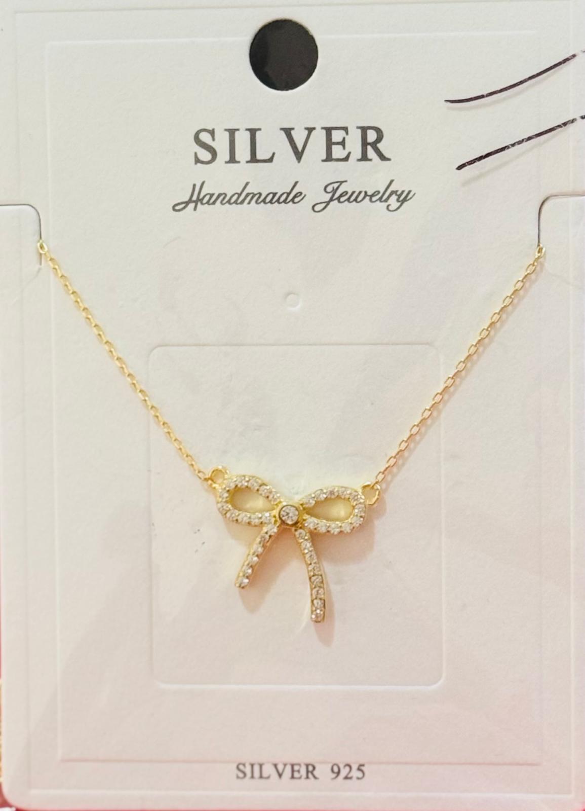 Silver pendant with Gold Charm 1